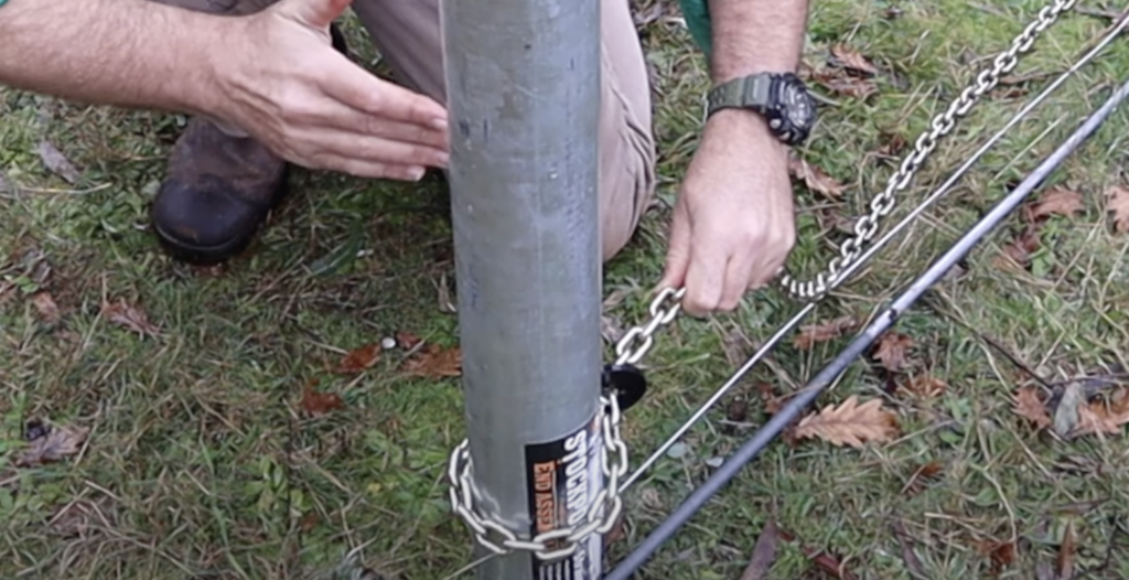 Start Straining Wire at Base of Post